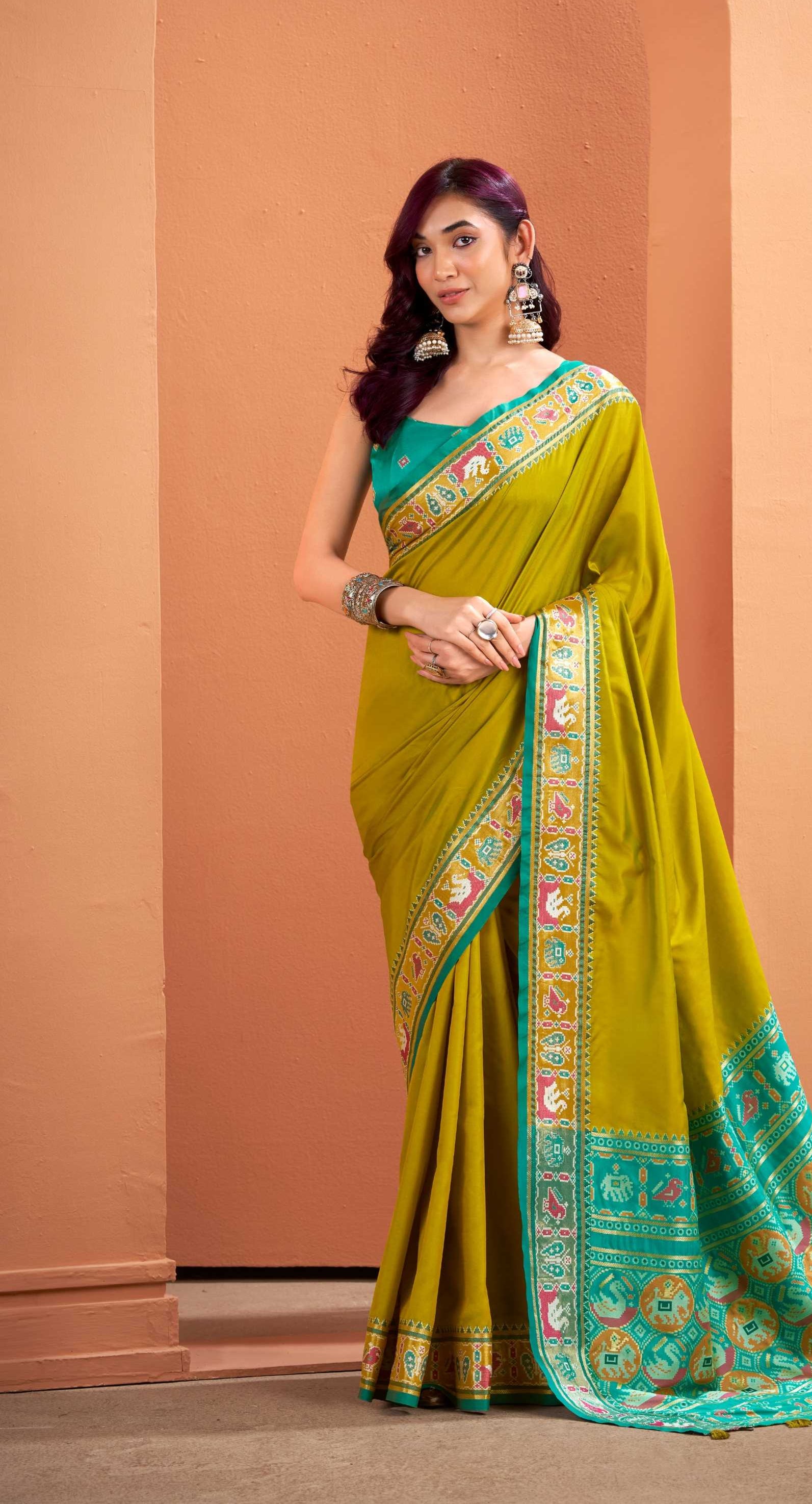 Olive green Soft Silk Saree with Patola Borders and Pallu