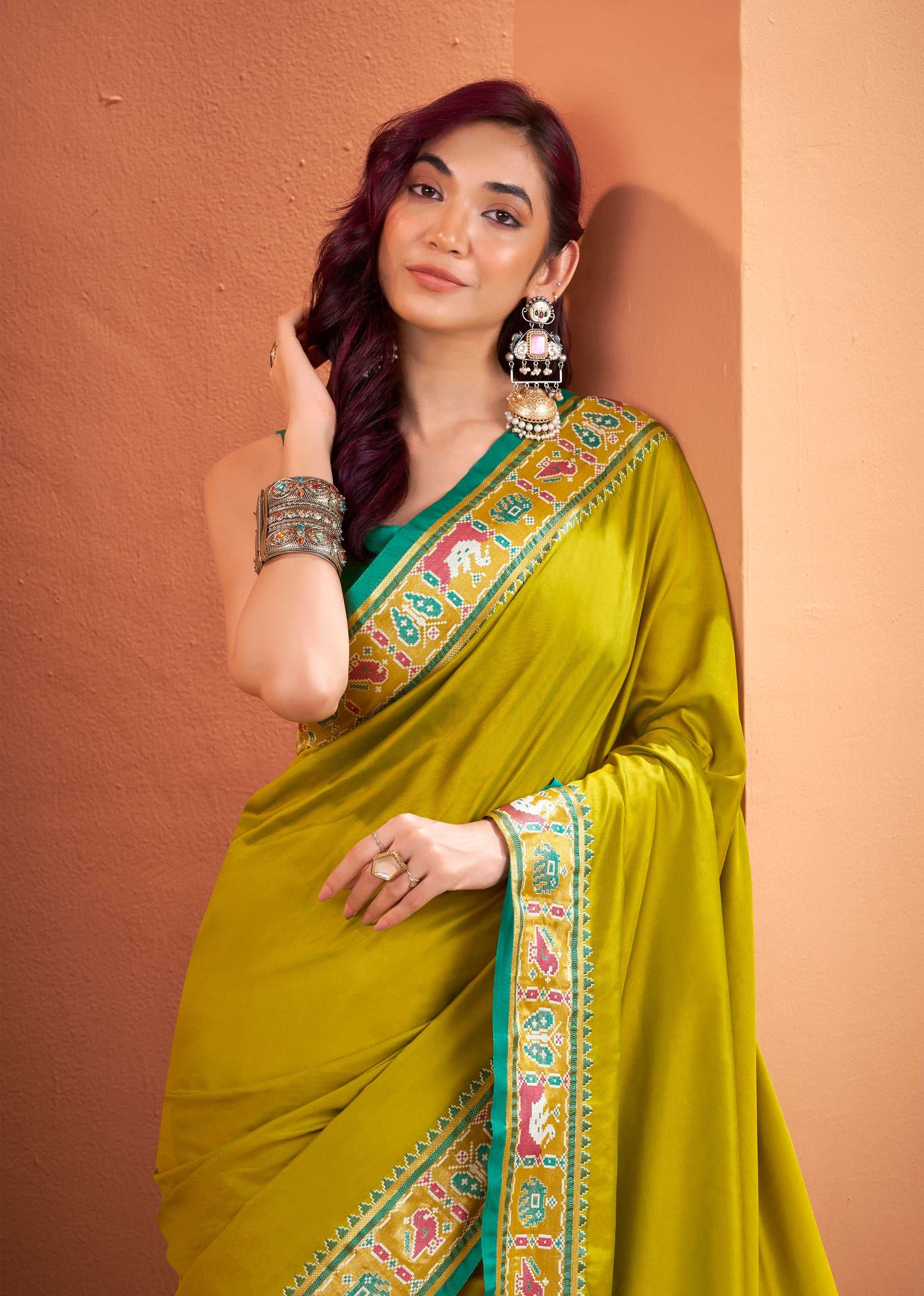 Olive green Soft Silk Saree with Patola Borders and Pallu