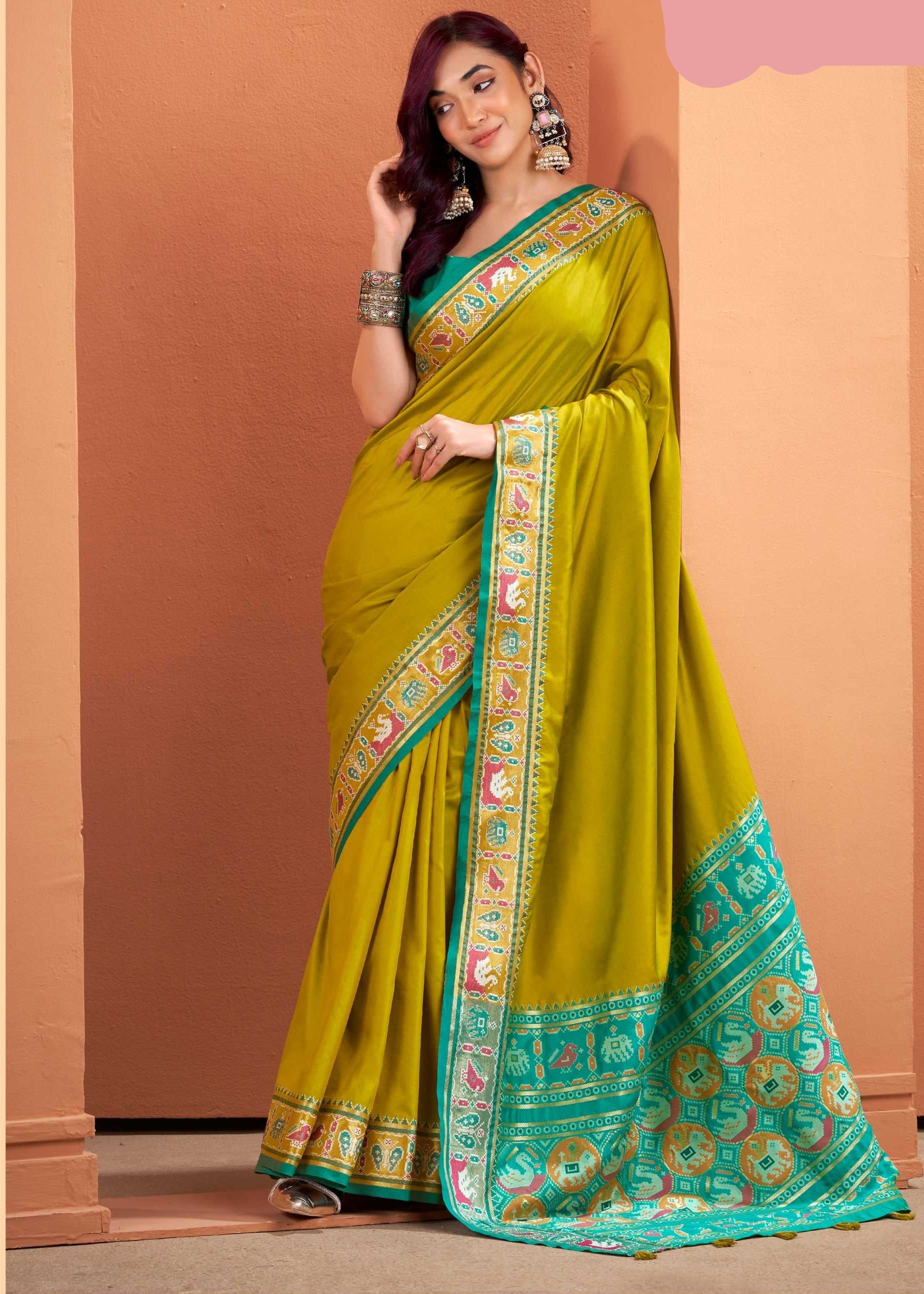 Olive green Soft Silk Saree with Patola Borders and Pallu
