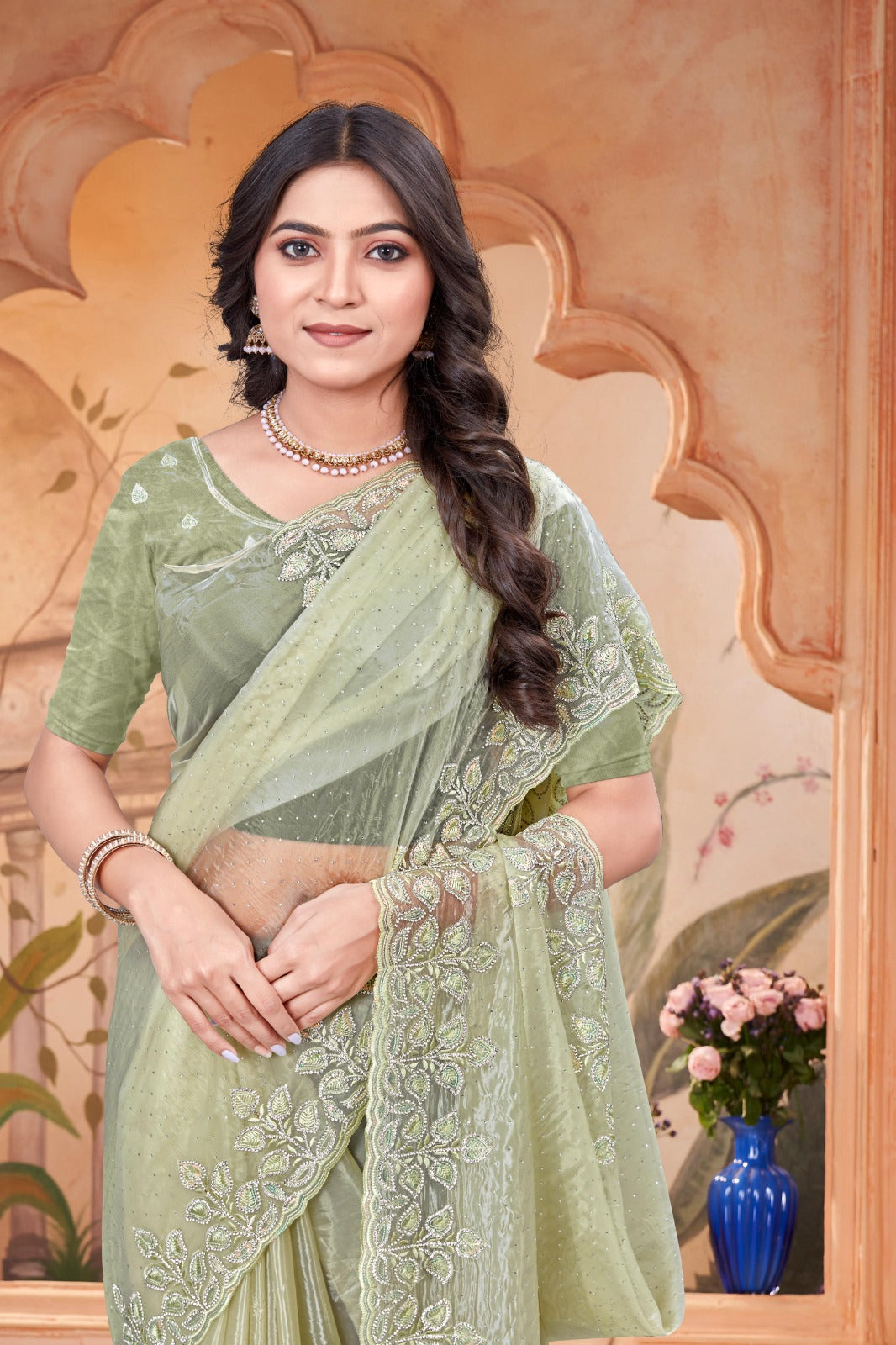 Embroidered crystal light green Saree