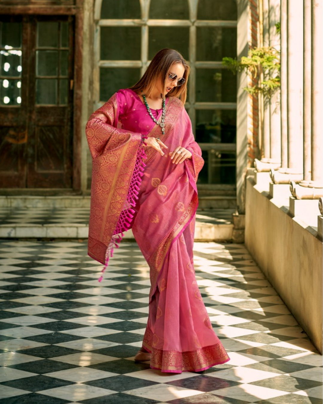 Pink soft tissue silk with zari weaving