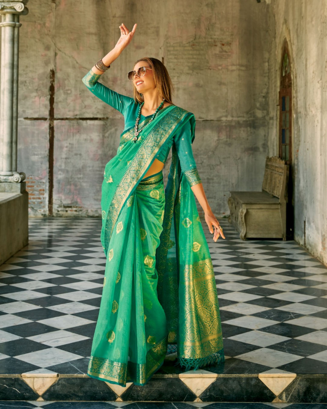 Sea green soft tissue silk with zari weaving