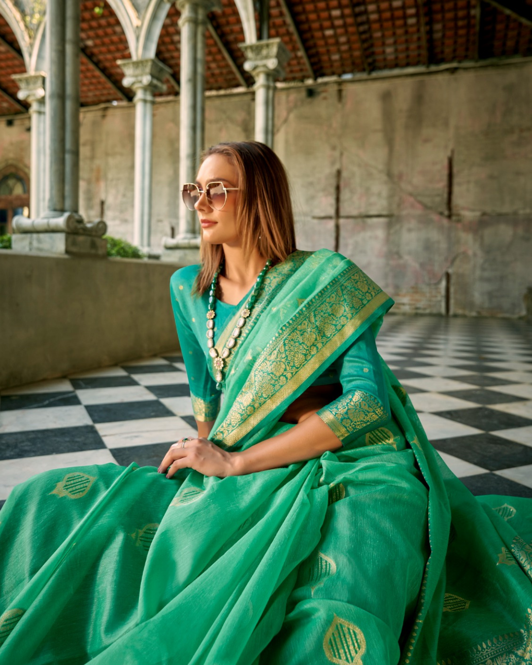 Sea green soft tissue silk with zari weaving