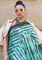 Teal Print Satin Crepe Sarees