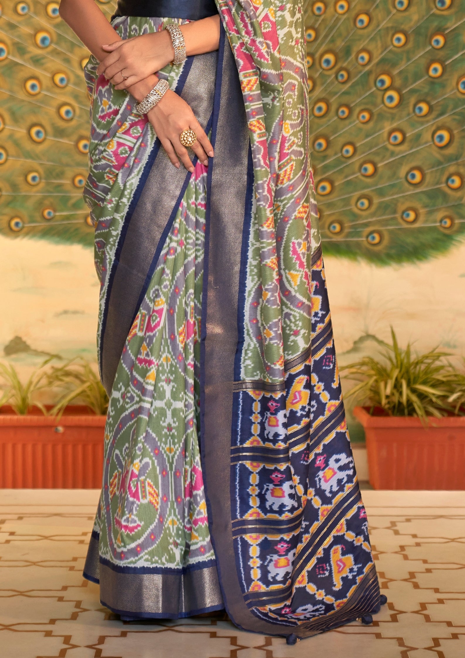 Sage Green Patola Saree With Royal Blue Border