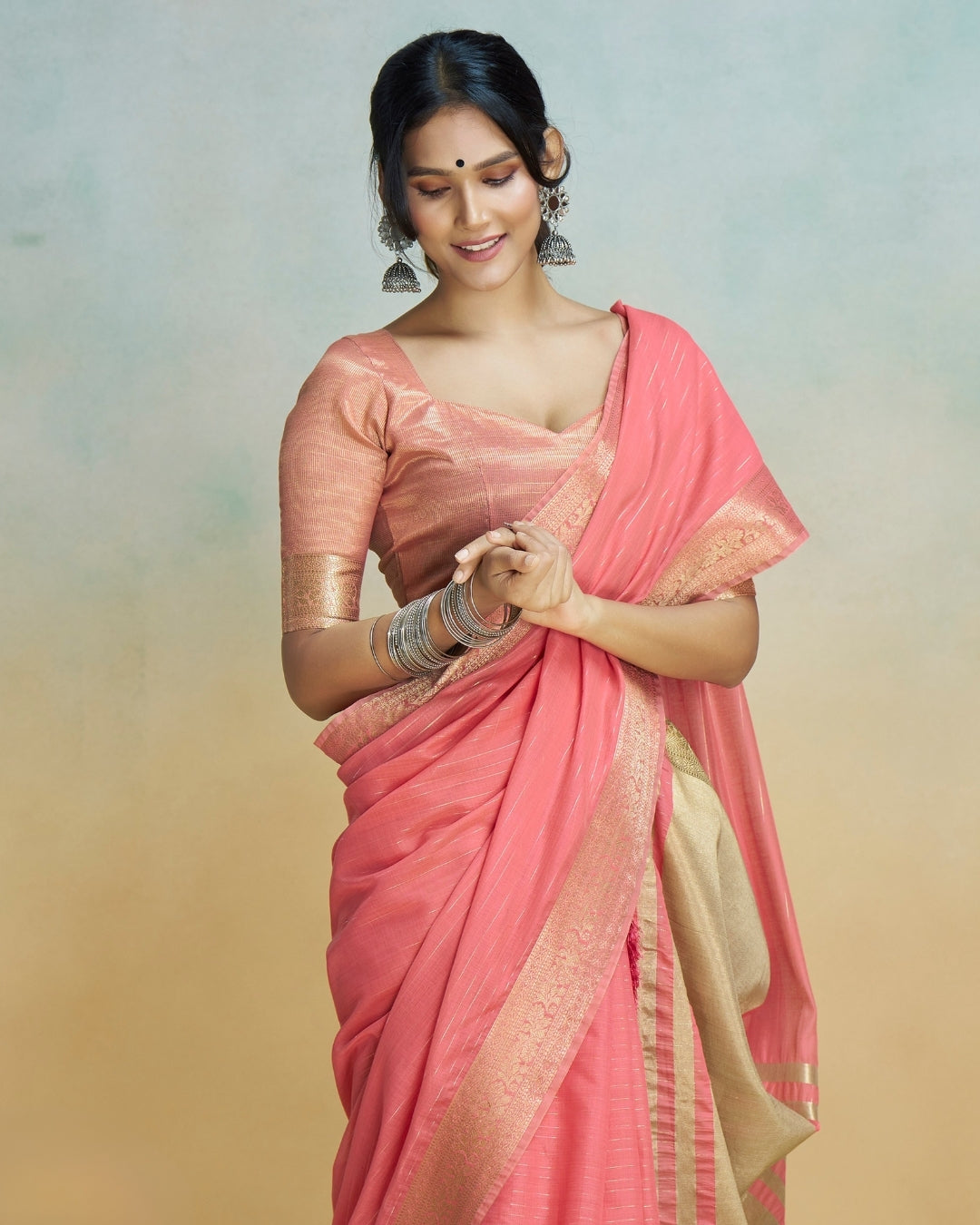 Peachy Pink  Khadi silk with golden borders
