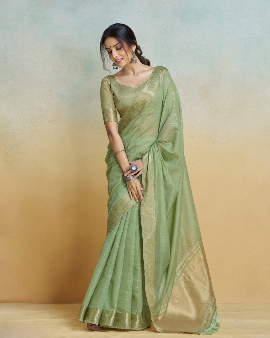 Green  Khadi silk with golden borders