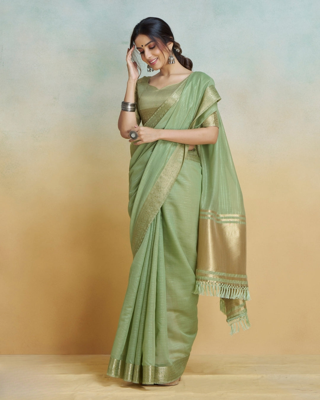 Green  Khadi silk with golden borders