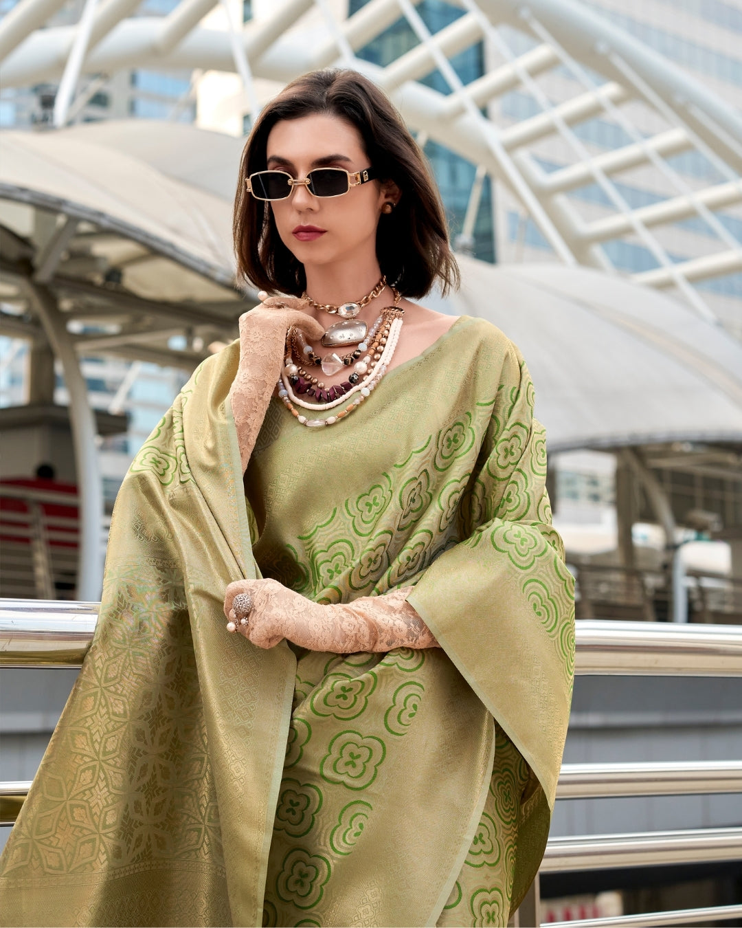 Olive green Buttery Silk Saree in Kanjivaram Pattern Weaving