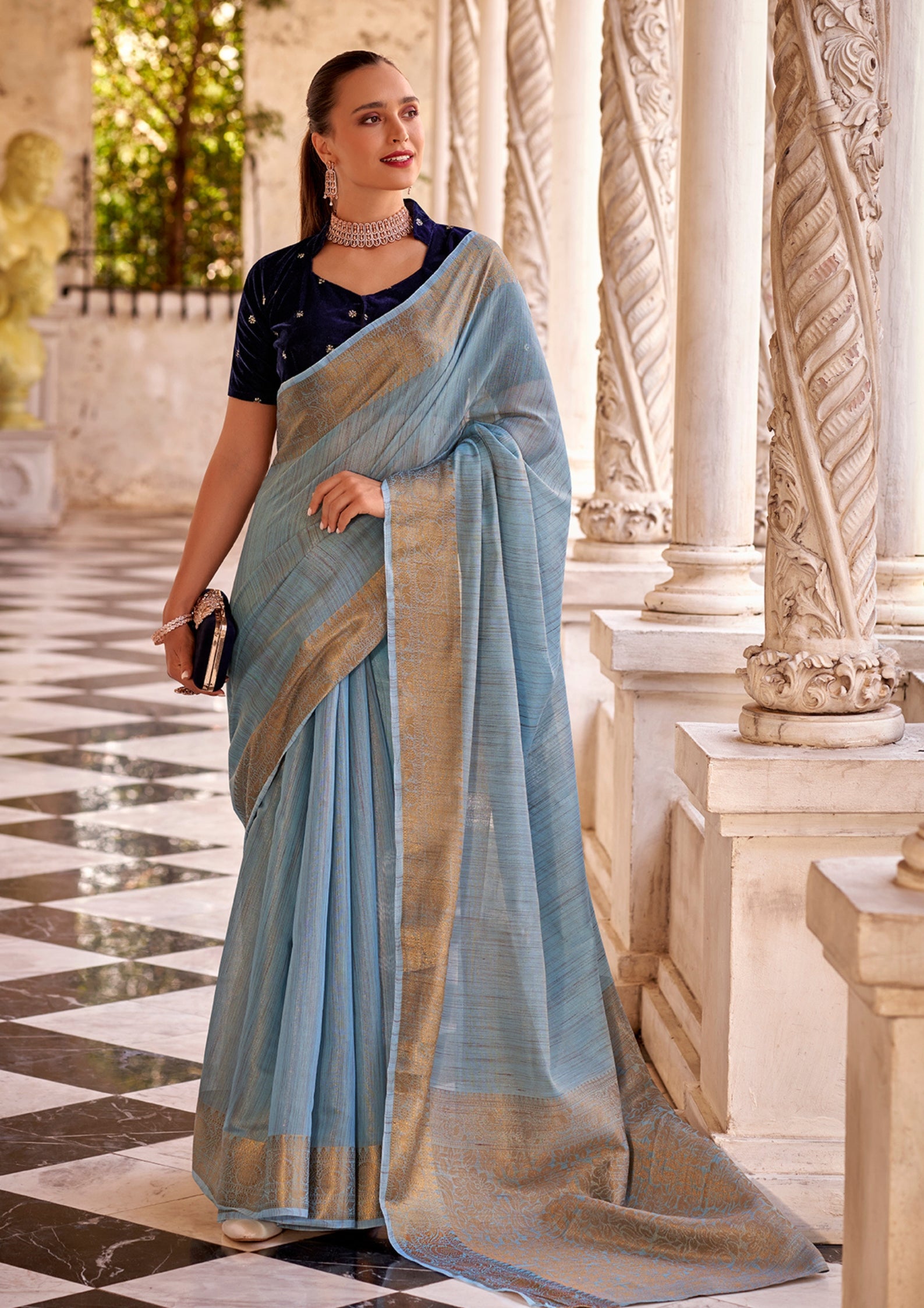 Delicate Silk Linen Tissue Light Blue and Golden Border Saree