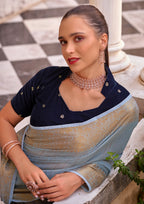 Delicate Silk Linen Tissue Light Blue and Golden Border Saree