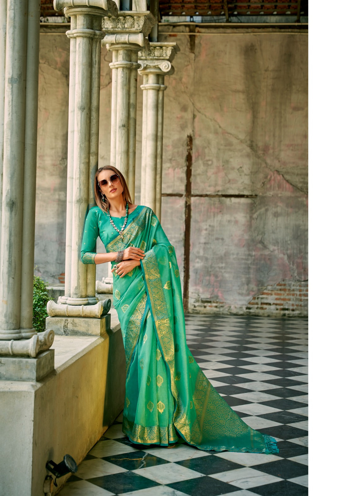 Sea green soft tissue silk with zari weaving