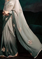 Sage Green Crushed Tissue Embroidered Border And Tassels Saree With Designer Blouse