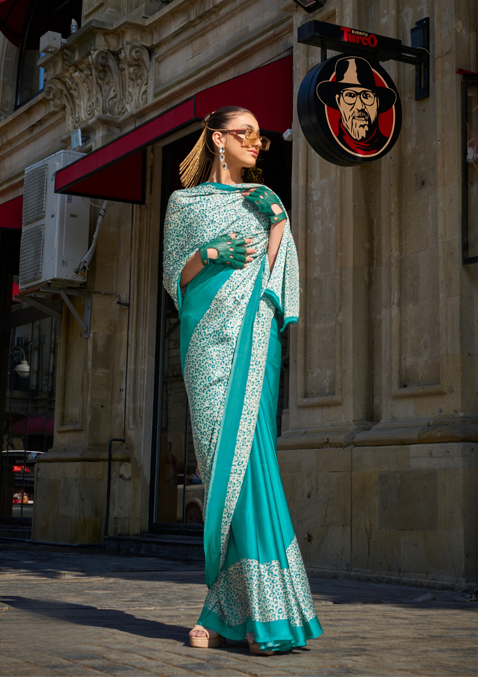 Turqoise Leopard Print Satin Crepe Saree