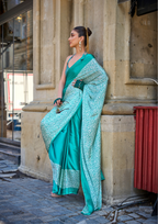 Turqoise Leopard Print Satin Crepe Saree
