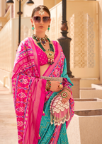 PV Silk Patola Design Turquoise Blue Saree With Contrast Border