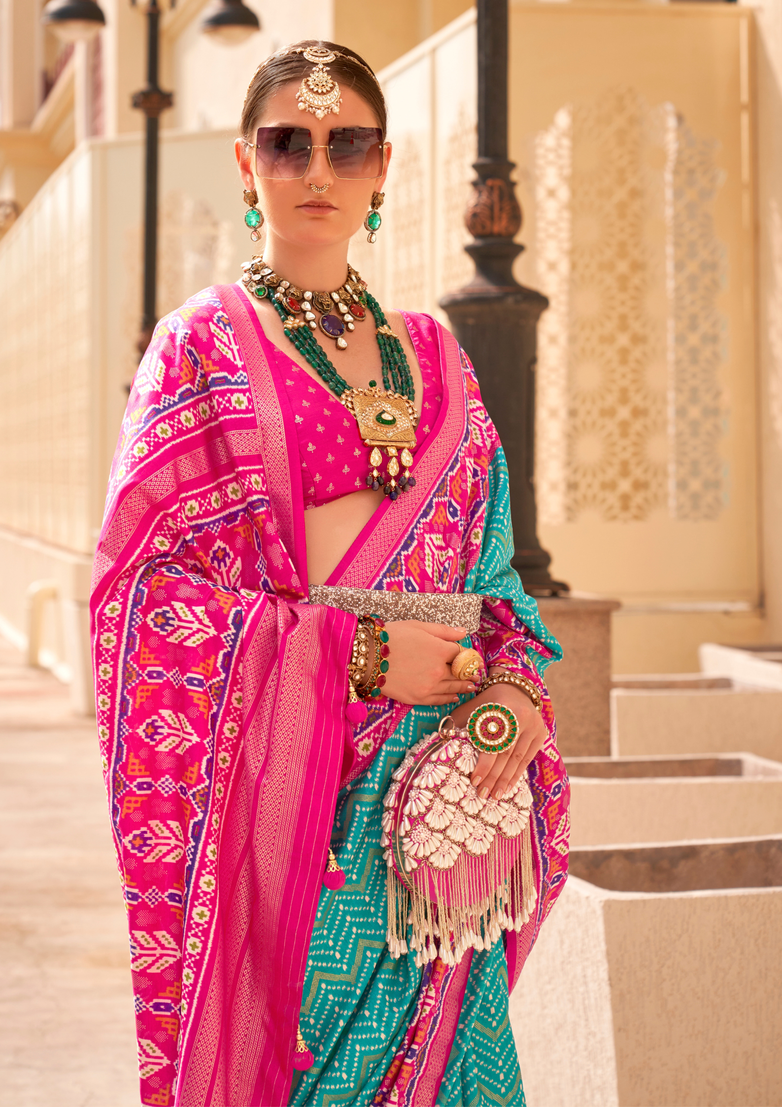 PV Silk Patola Design Turquoise Blue Saree With Contrast Border