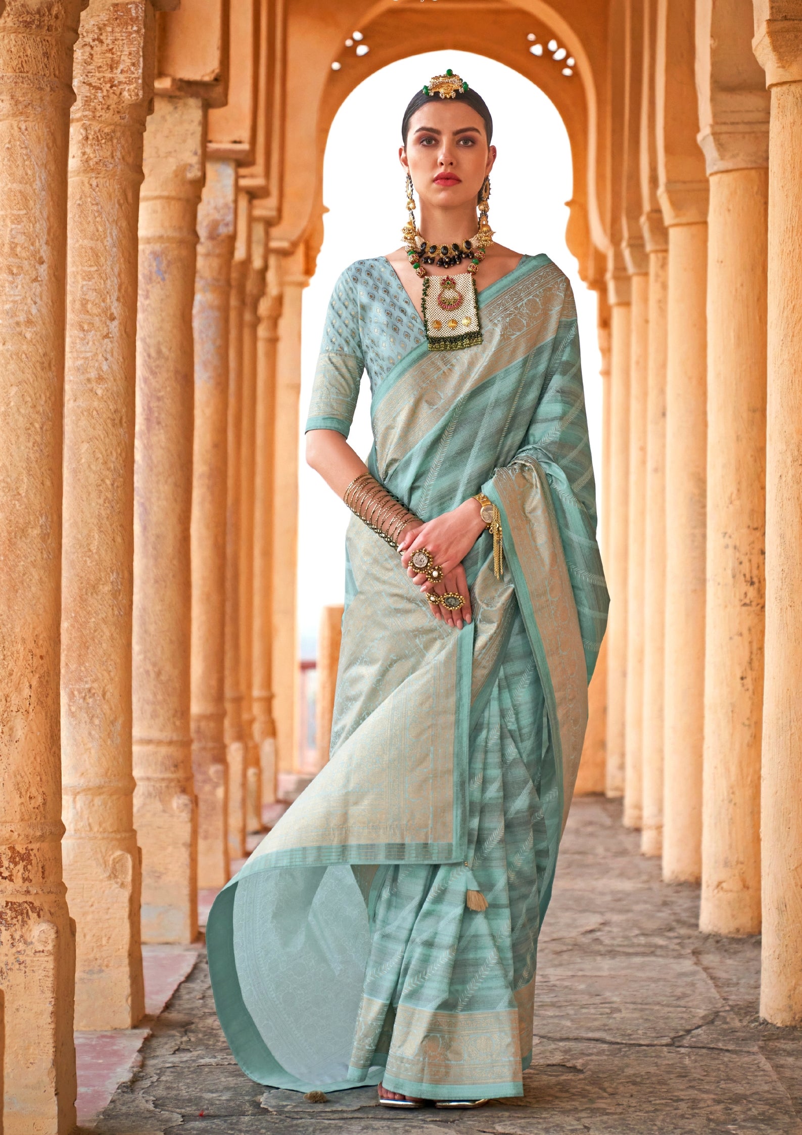 PV Silk Aqua Finish Teal Saree With Golden Border