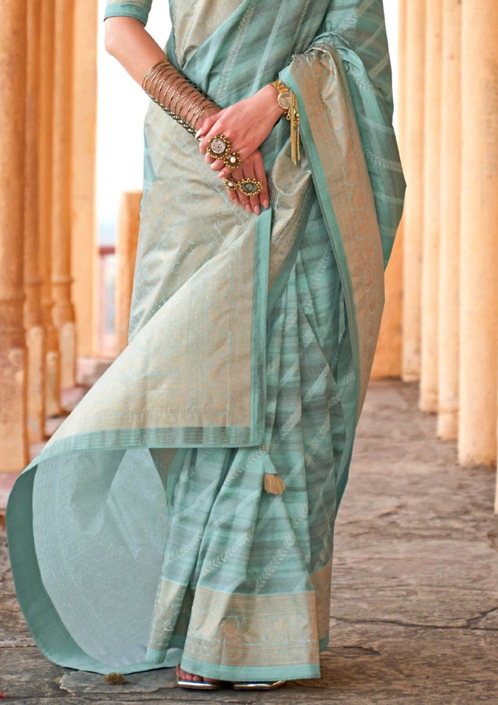 PV Silk Aqua Finish Teal Saree With Golden Border