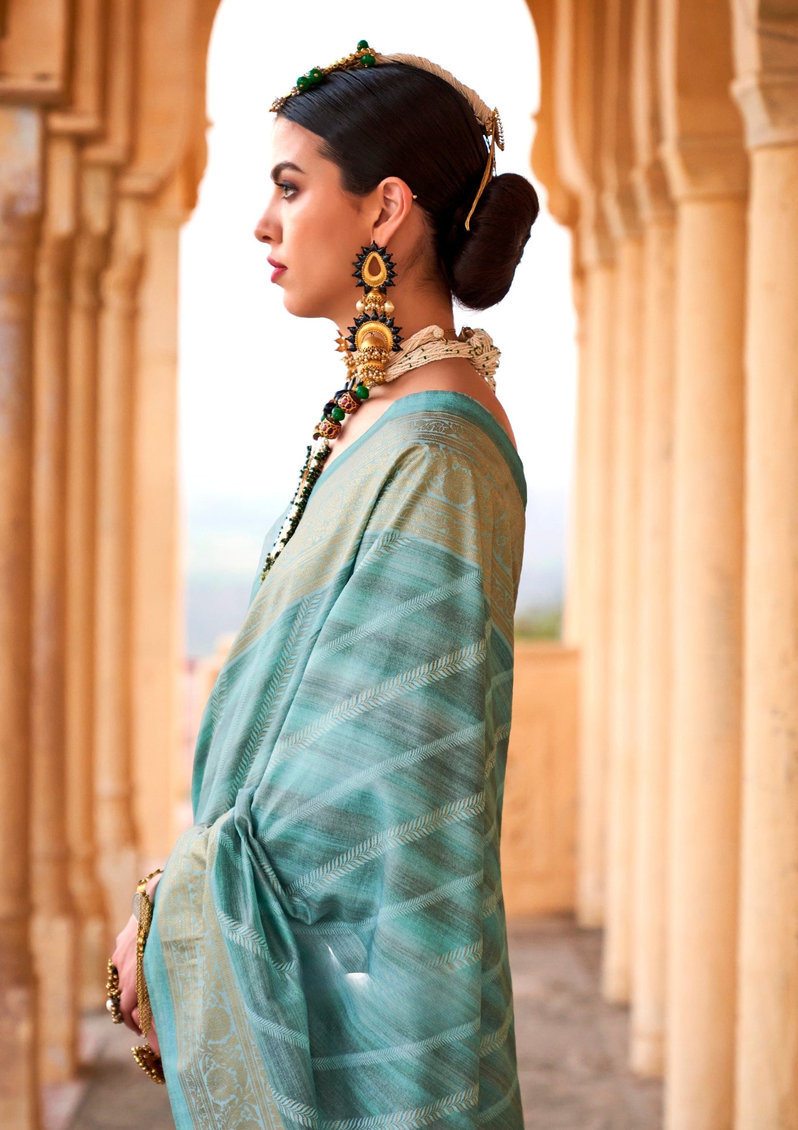 PV Silk Aqua Finish Teal Saree With Golden Border