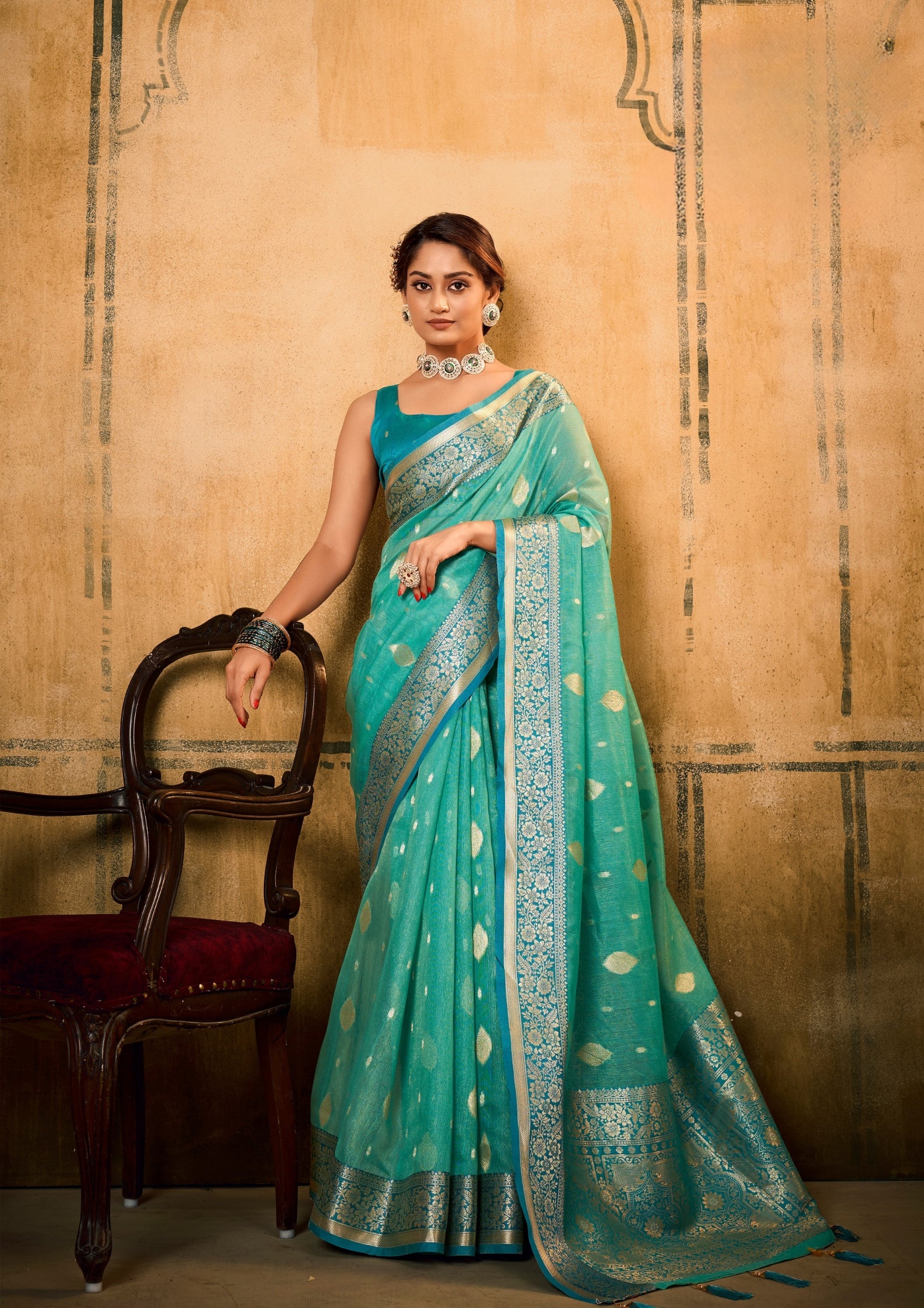 Banarsi Tissue with Contrast Border Zari Work Turquoise Blue Saree