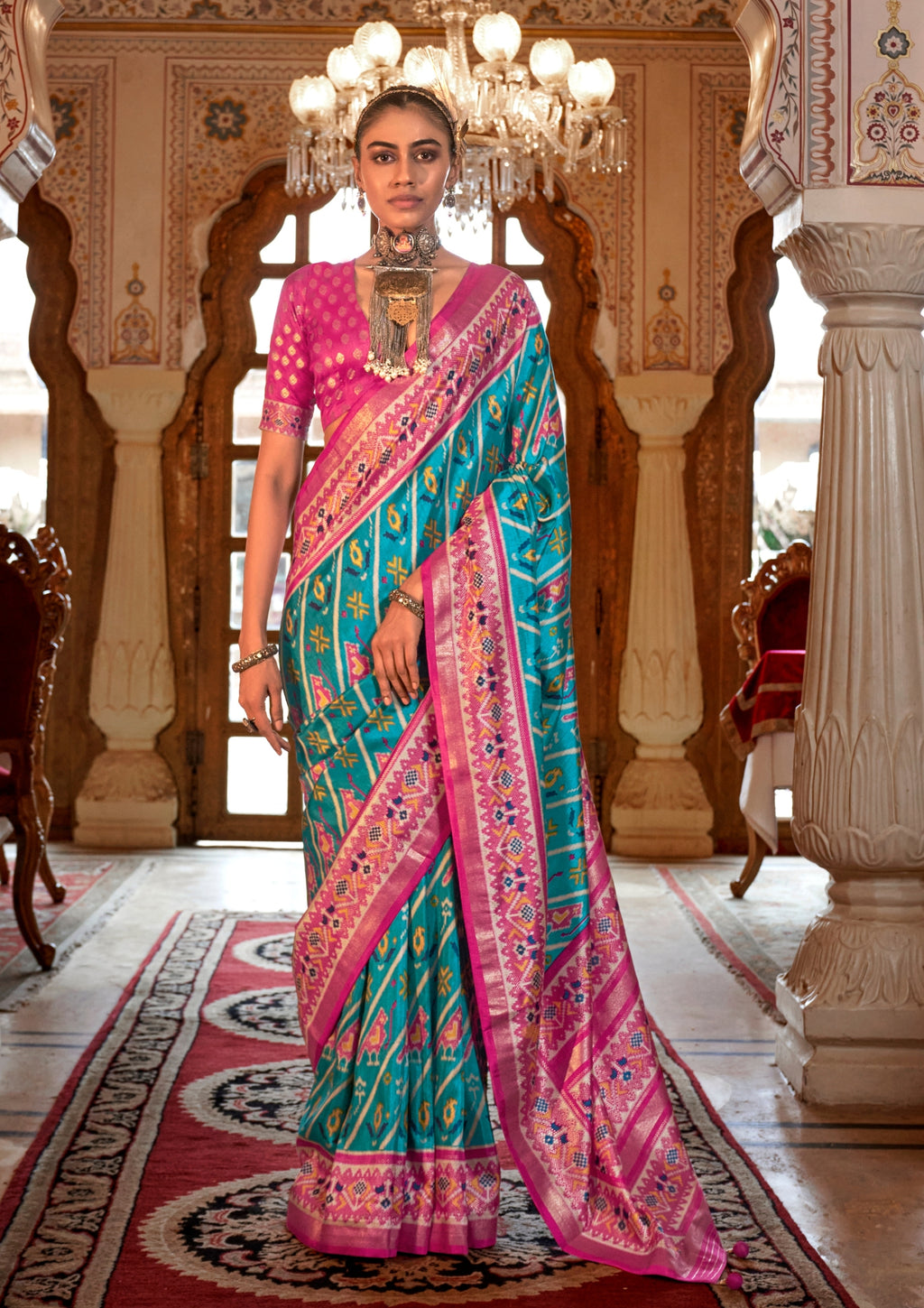Super PV Silk Patola Design Teal Saree With Contrast Border