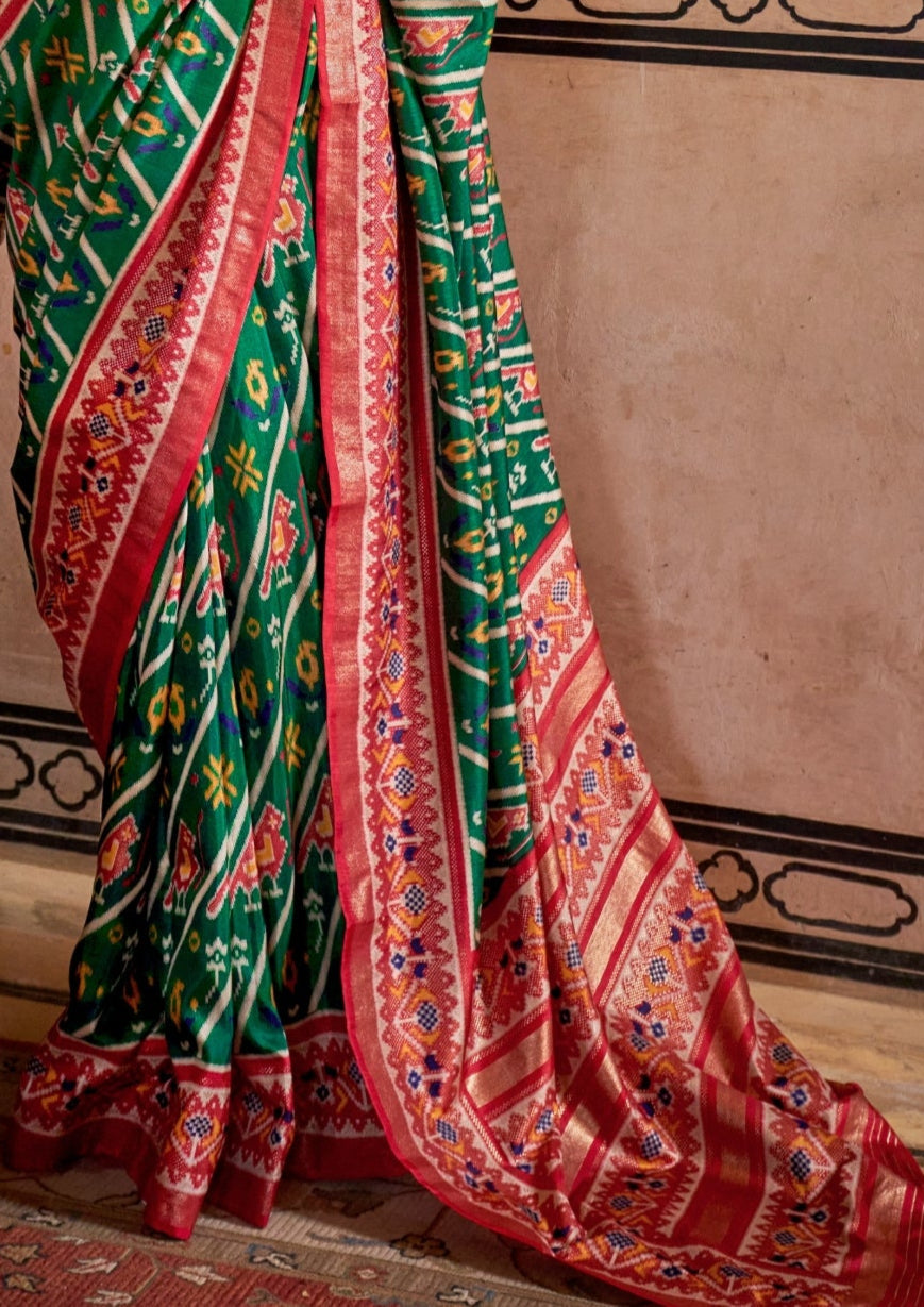 Super PV Silk Patola Design Dark Green Saree With Contrast Border