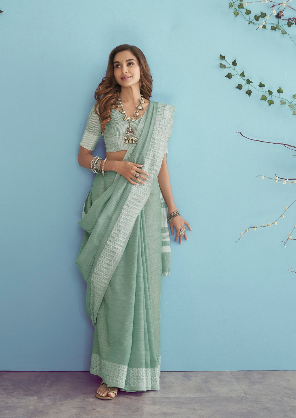 Linen Silk With Chikankari Weaved Border Pastel Green Saree