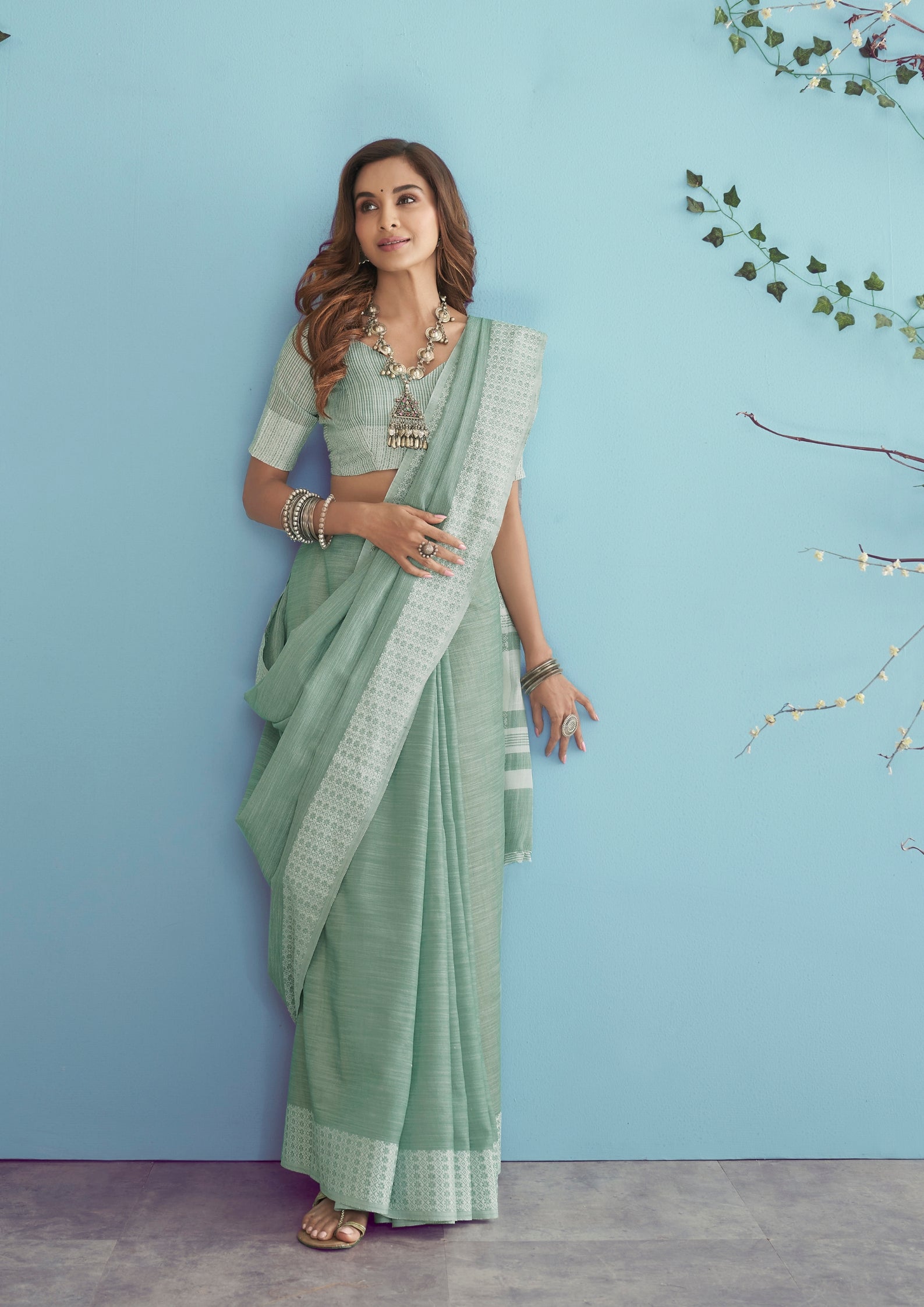 Linen Silk With Chikankari Weaved Border Pastel Green Saree