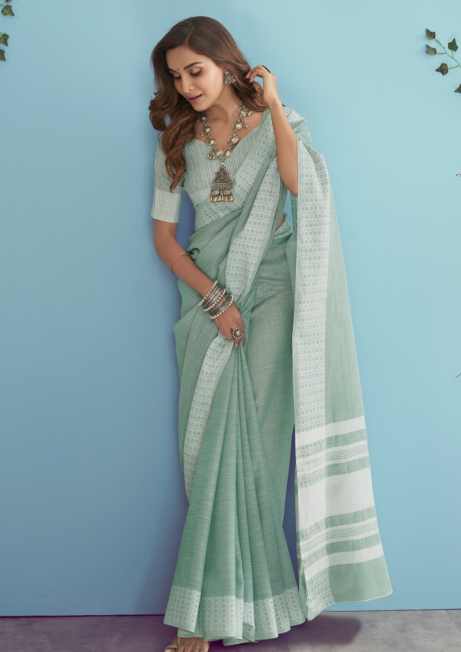 Linen Silk With Chikankari Weaved Border Pastel Green Saree