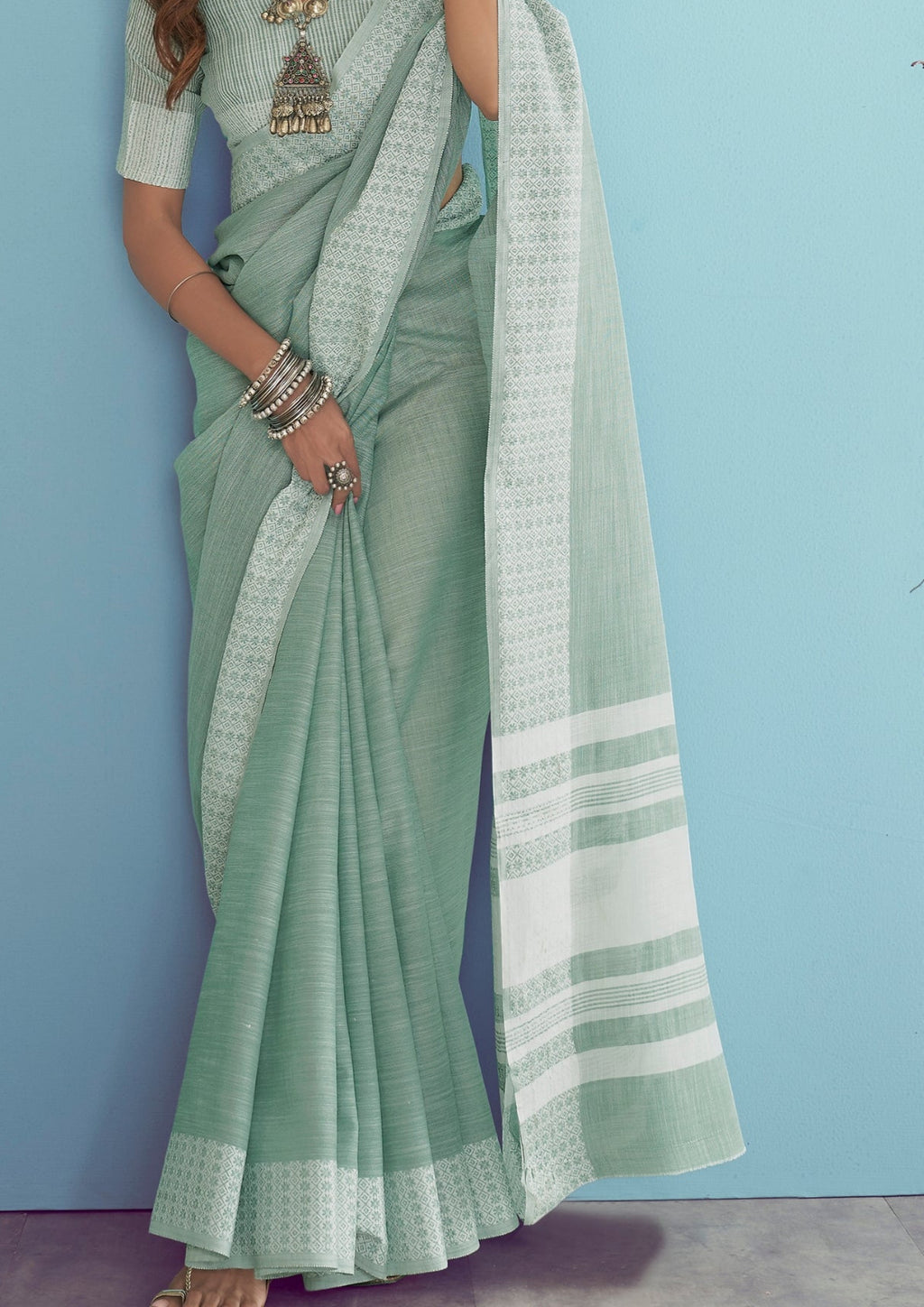 Linen Silk With Chikankari Weaved Border Pastel Green Saree