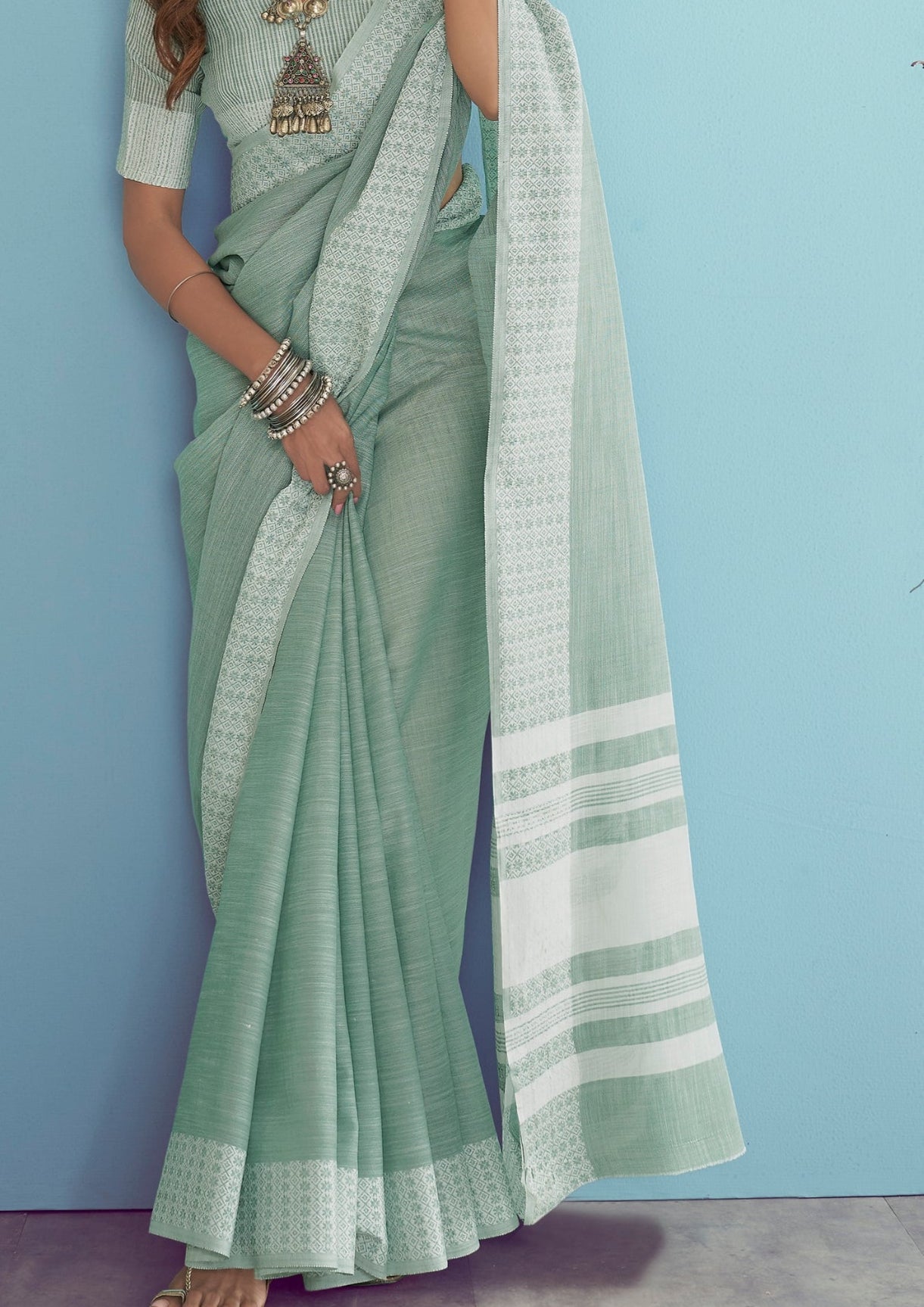 Linen Silk With Chikankari Weaved Border Pastel Green Saree