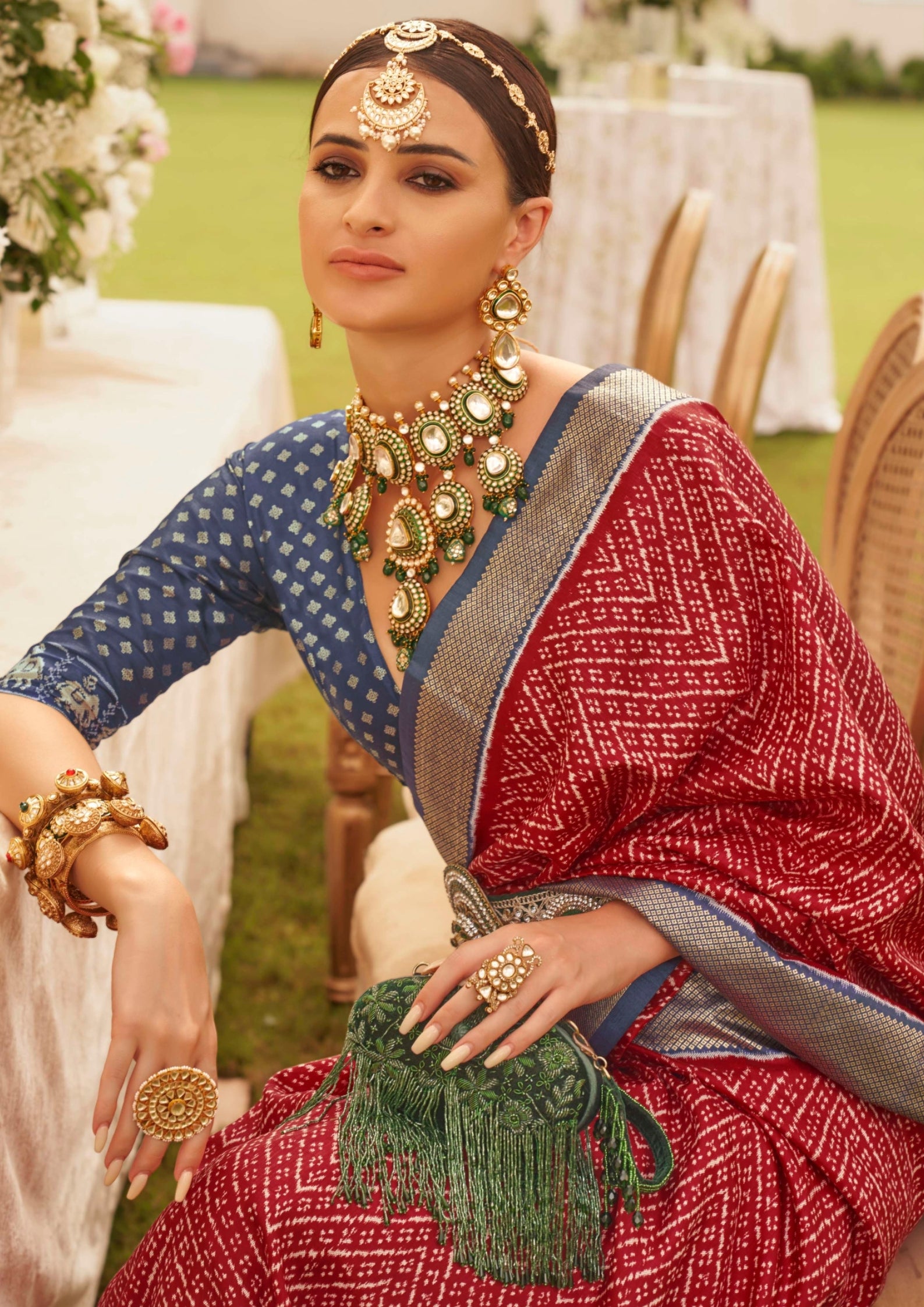 Patola Silk Saree of Red and Contrast Border with Gold Printed Kandora