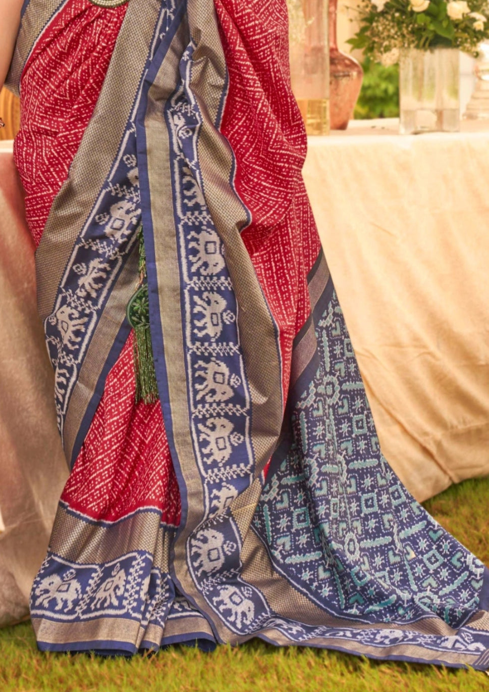 Patola Silk Saree of Red and Contrast Border with Gold Printed Kandora