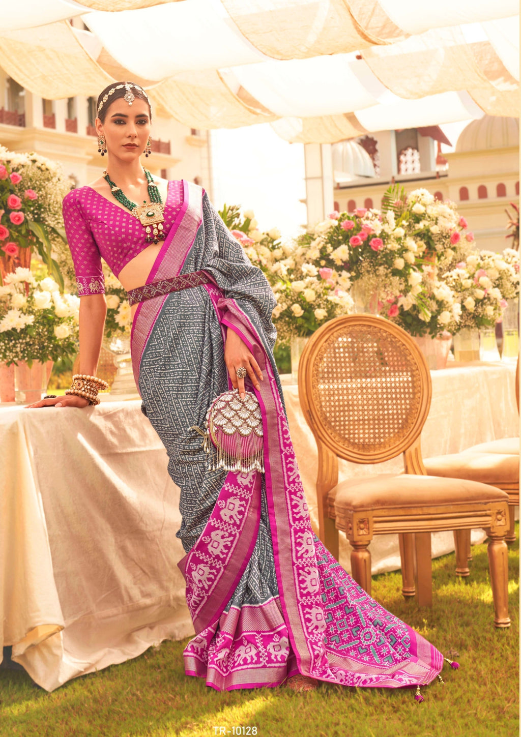 Patola Silk Saree of Navy Blue and Contrast Border with Gold Printed Kandora